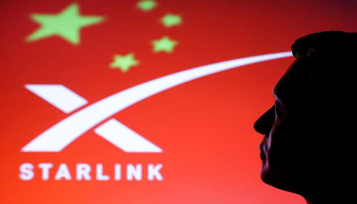 A 3D-printed miniature model of Elon Musk, a Chinese flag and the Starlink logo are seen in this illustration taken, February 20, 2025. — Reuters