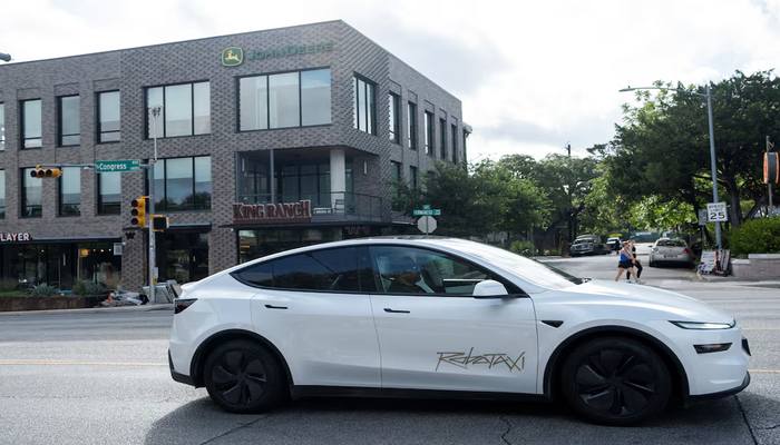 A Tesla robotaxi drives on the street along South Congress Avenue in Austin, Texas, US, June 22, 2025. — Reuters