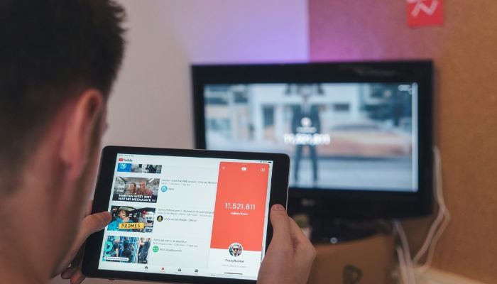 An undated image of a person using YouTube. — Unsplash