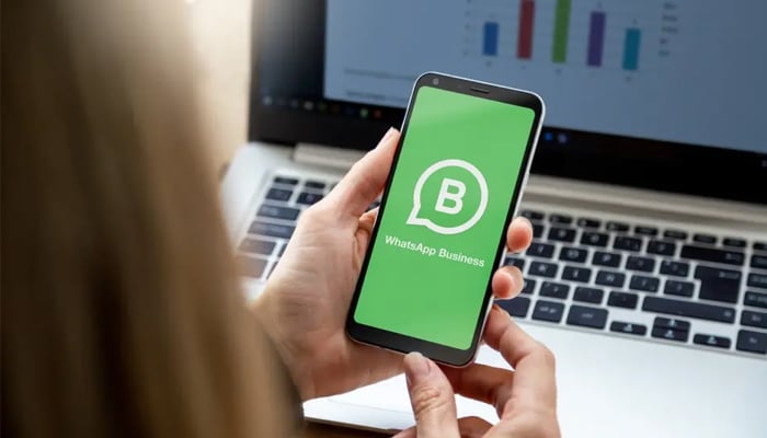 An undated image of WhatsApp Business app logo on smartphone. — Shutterstock