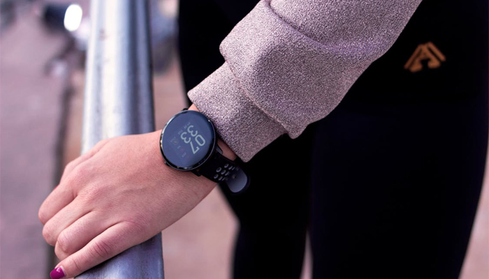 An undated image of a person wearing Wear OS watch. — Pexels