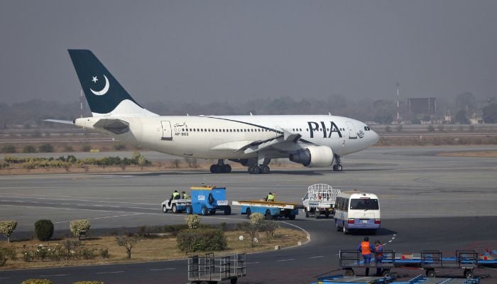 A PIA plane prepares for takeoff at Lahore’s Allama Iqbal International Airport, February 1, 2012. — Reuters