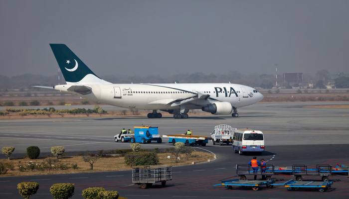 A Pakistan International Airlines (PIA) plane prepares to take-off at Alama Iqbal International Airport in Lahore February 1, 2012. — Reuter