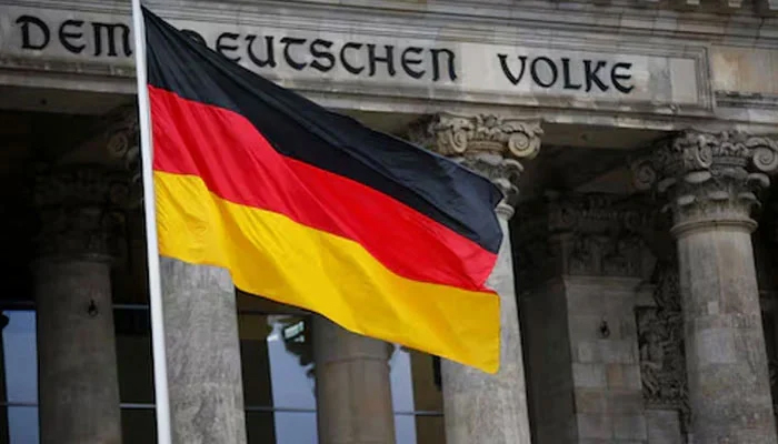The German flag is seen outside Germanys Bundestag, the lower house of parliament. in Berlin, Germany. — Reuters