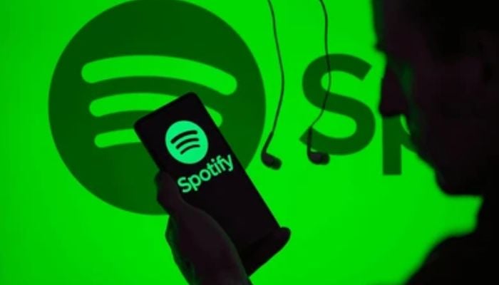 An undated image of a person using Spotify. — iStock