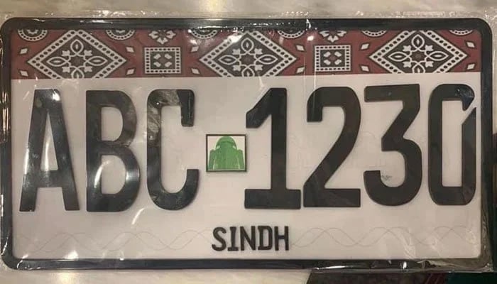 This representational image shows a Ajrak-themed number plate. — APP
