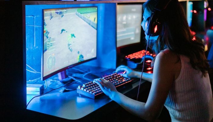An undated image of a girl playing game. — Canva