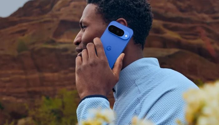 An image of a person using a Pixel 10 phone. Google Blog