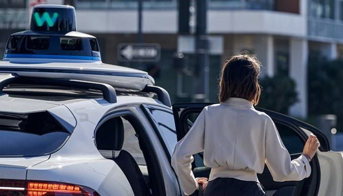 An undated image of using Waymo taxi. — Waymo