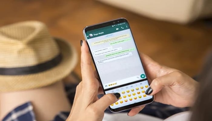 An undated image of person using WhatsApp. — Shutterstock