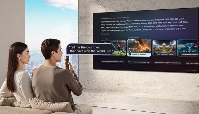 A representational image of a couple using Samsung Electronics Vision AI Companion system on TV. — Samsung Newsroom