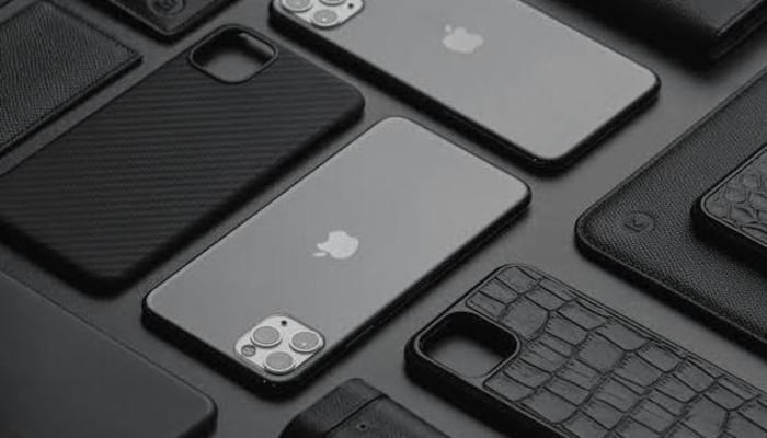 An undates image of an iPhone variant along with its cases. — Unsplash