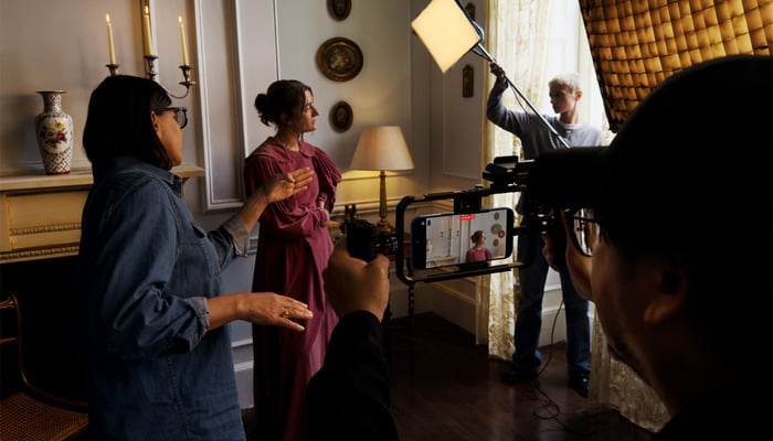 An undated image of people using Apples Final Cut Camera 2.0 feature. — Apple