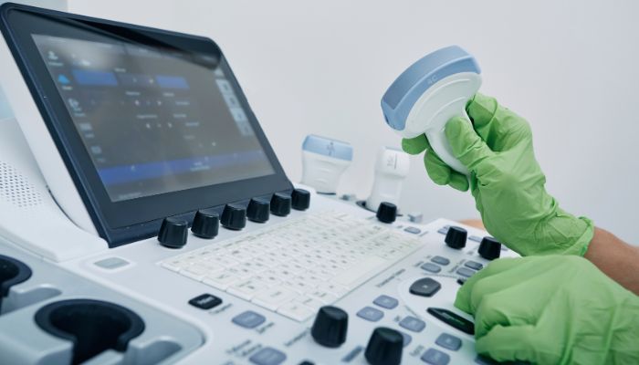 An undated image of a person using ultrasound machine. — Canva